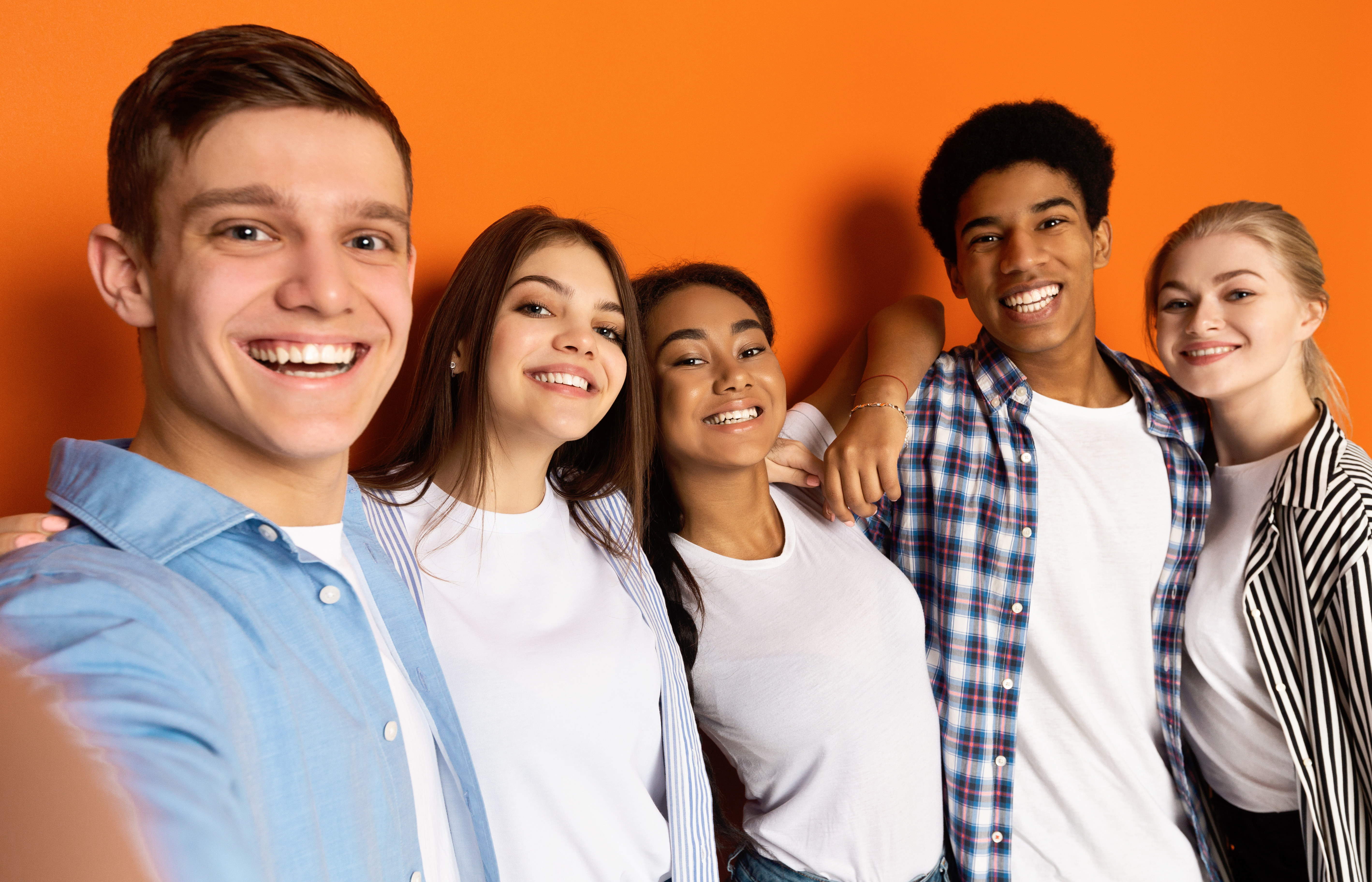 teen-friends-making-selfie-and-having-fun-orange-b-U4GGEH8